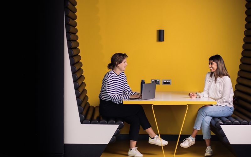 Octopus Ventures team members chatting in the office
